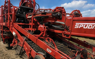 2011 Spudnik 6440 Digger, close view of the digging chains